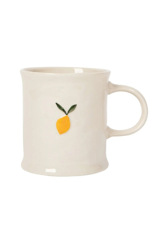 White mug with a lemon design on a white background