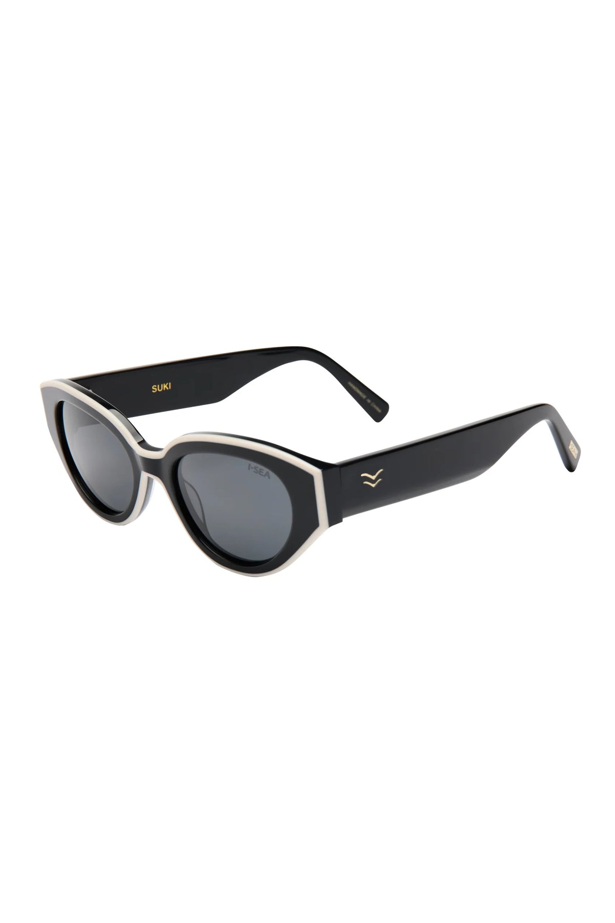 Cat-eye sunglasses with black lenses and gold frame on a white background
