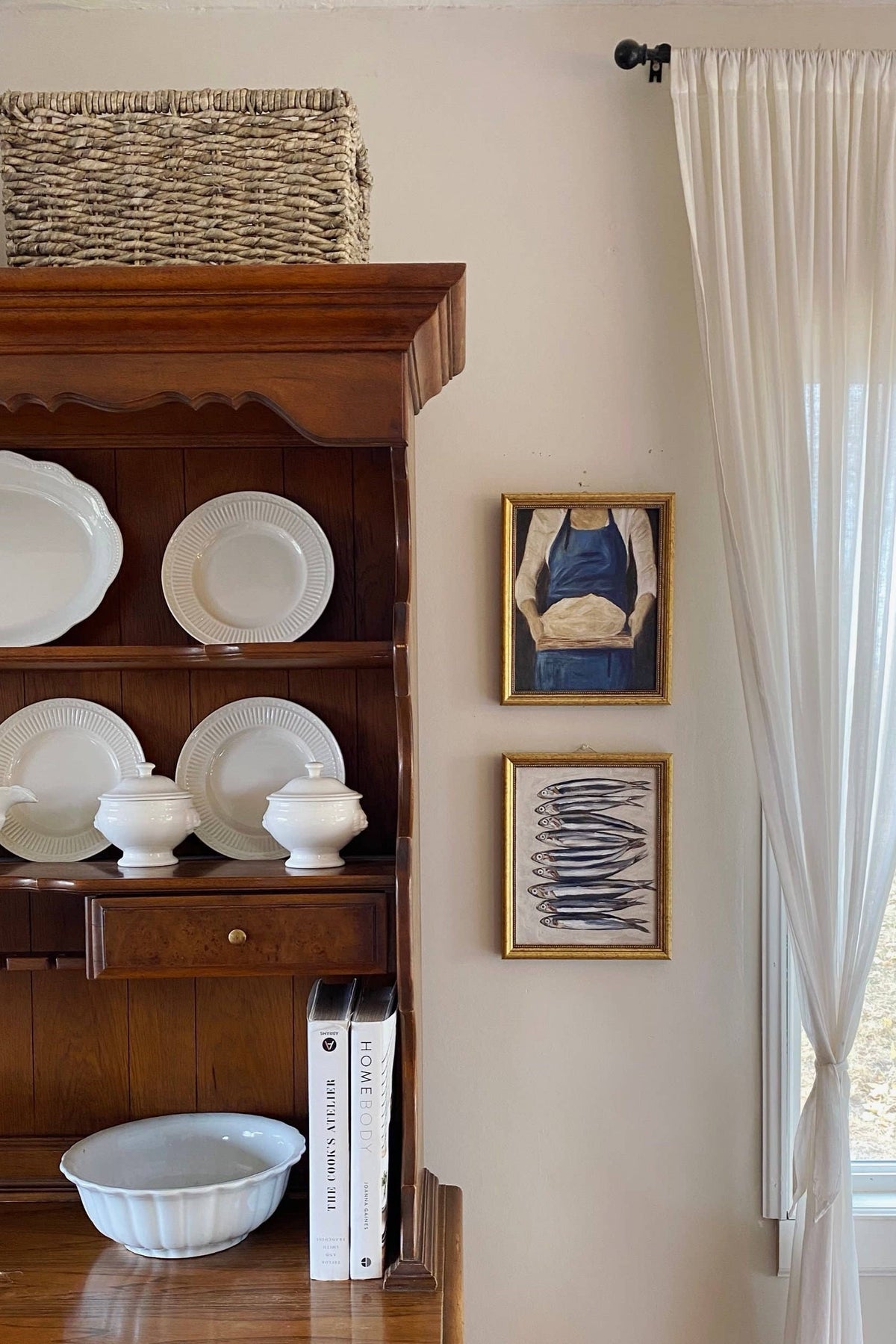 picture of sardines in a kitchen with white dishes in a hutch